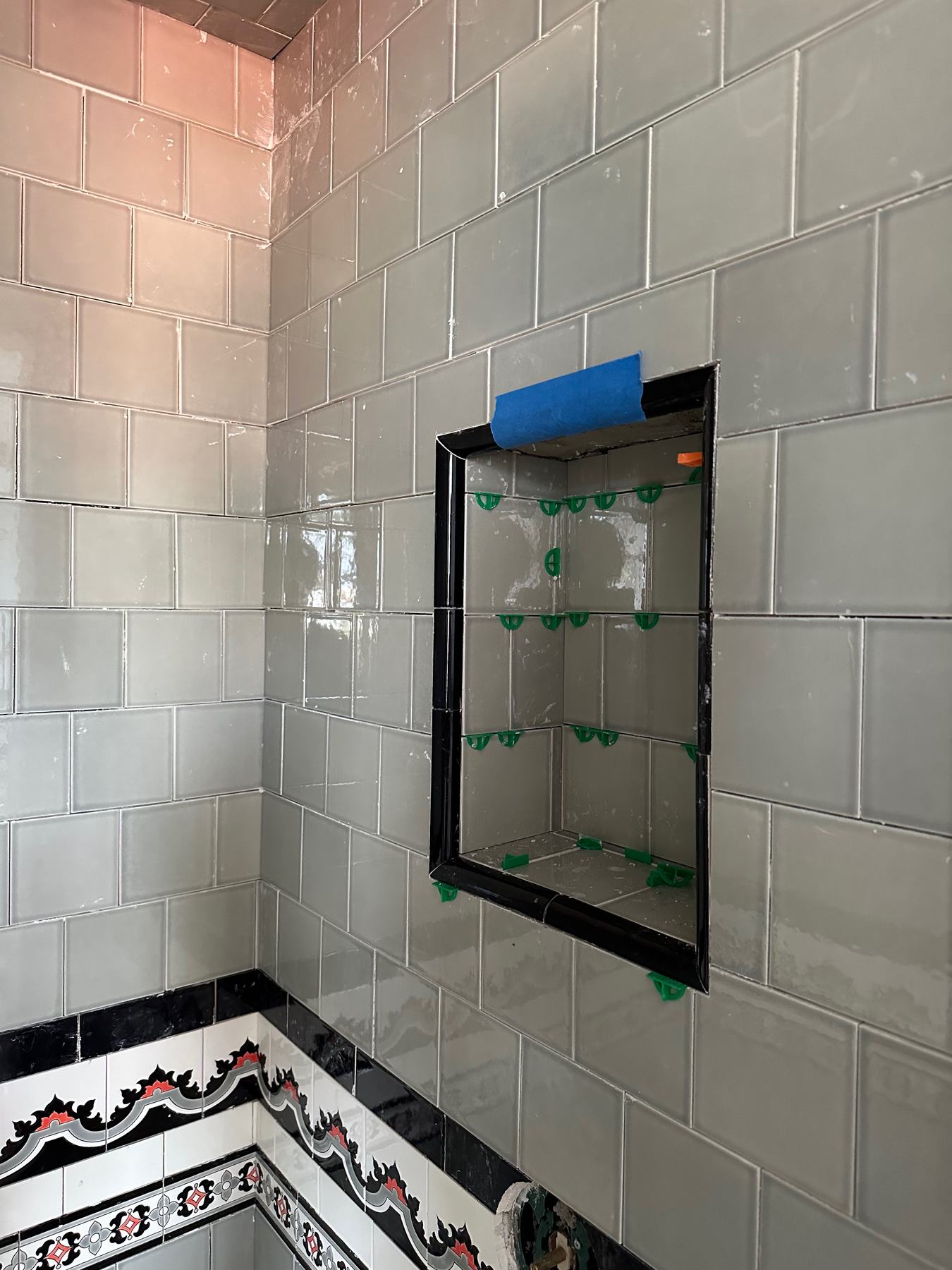 Black trimmed shower niche