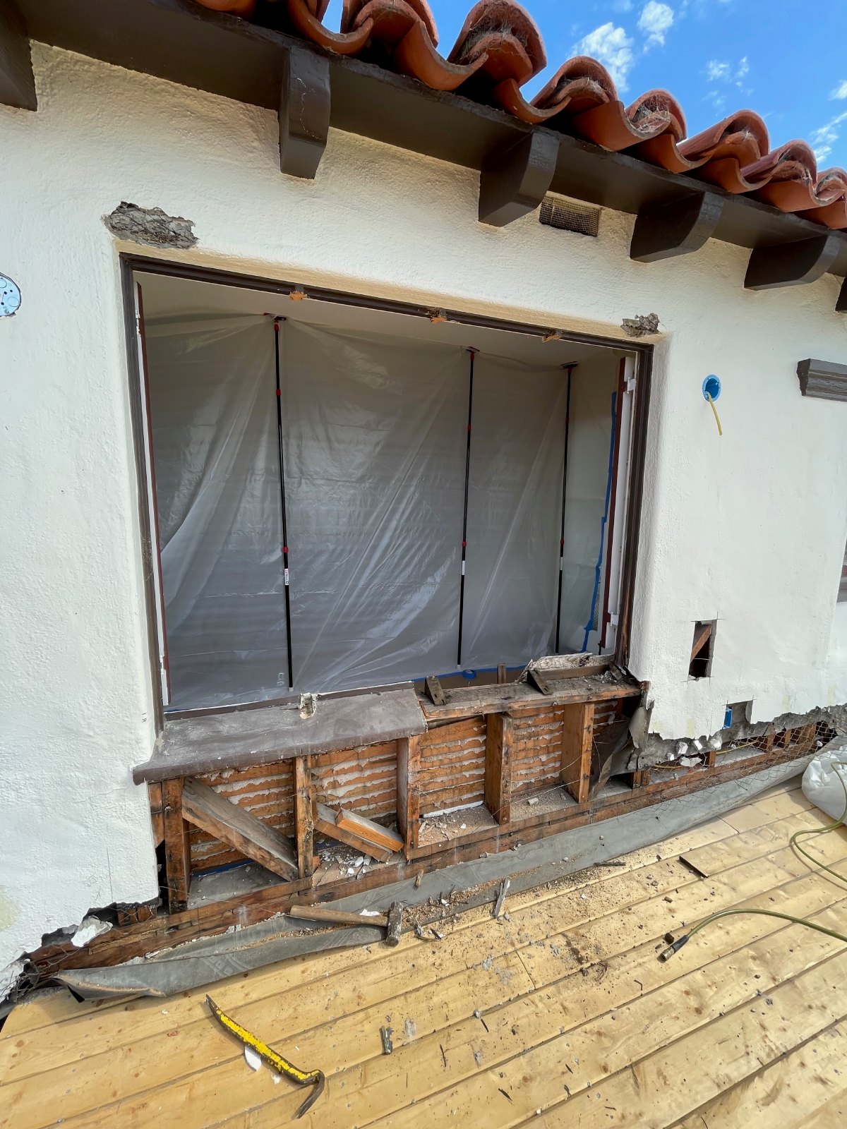 Historic wall opened during demolition for custom double doors