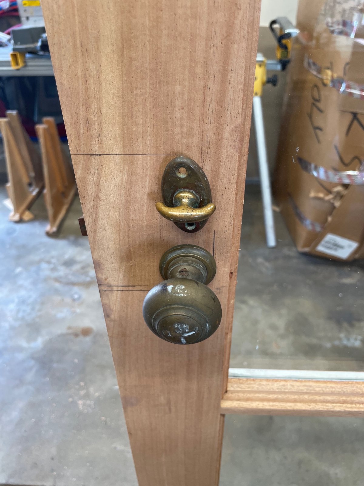 Historic hardware installed on custom wood door