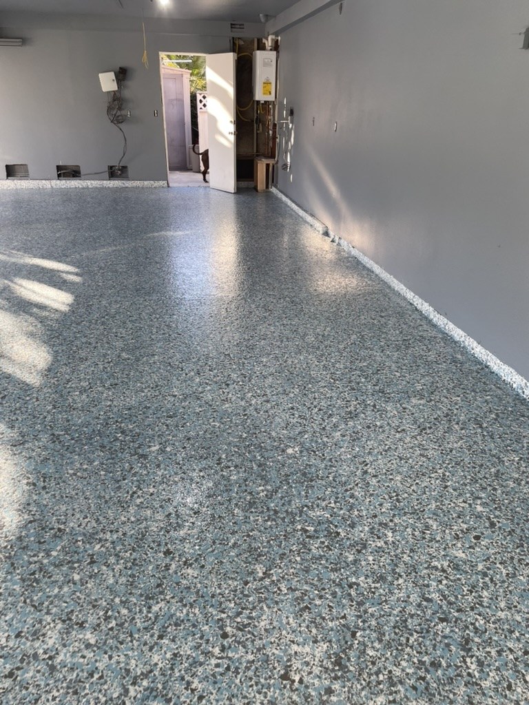 Finished garage with epoxy floor and storage