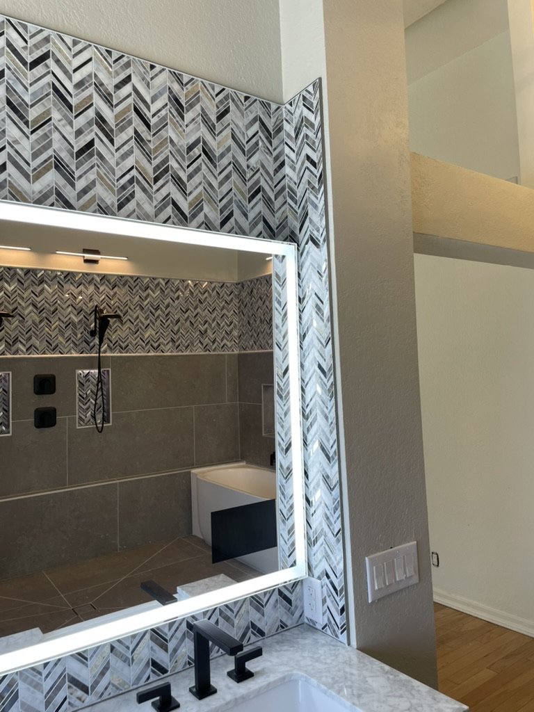 Integrated display built into bathroom mirror