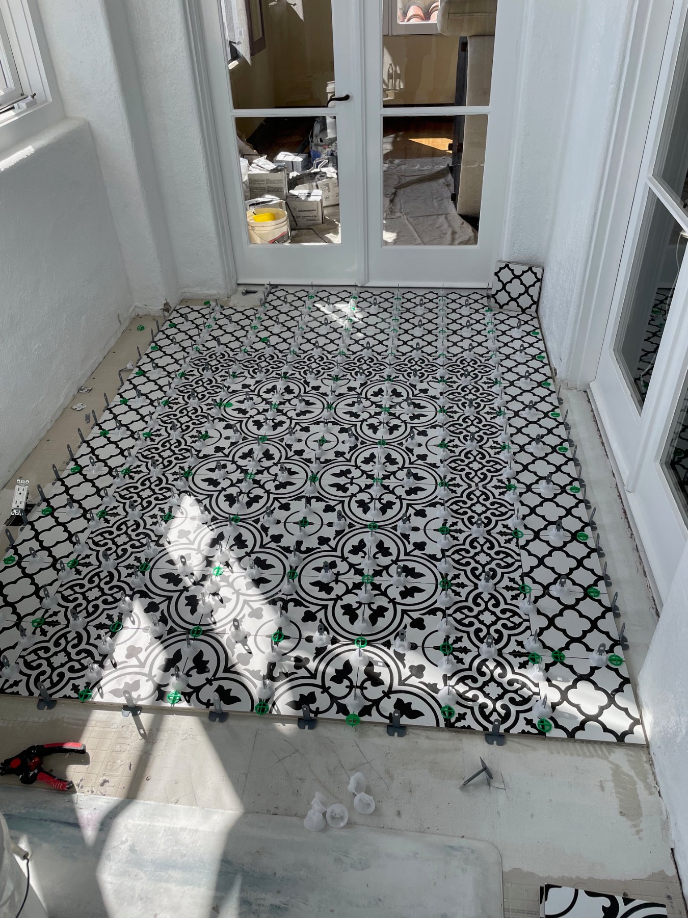 Beginning layout of custom patterned tile floor
