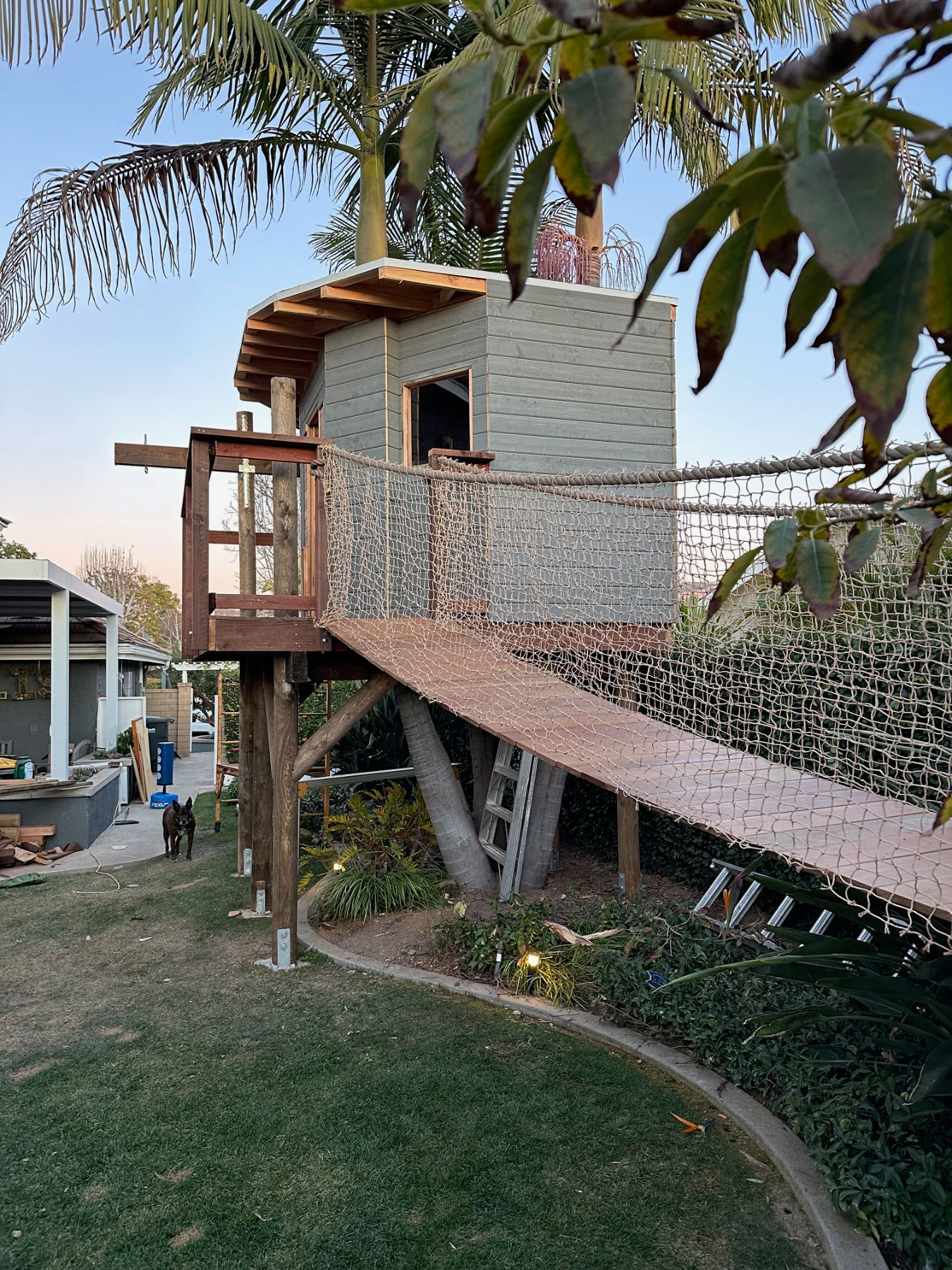 Suspension bridge leading to tree house